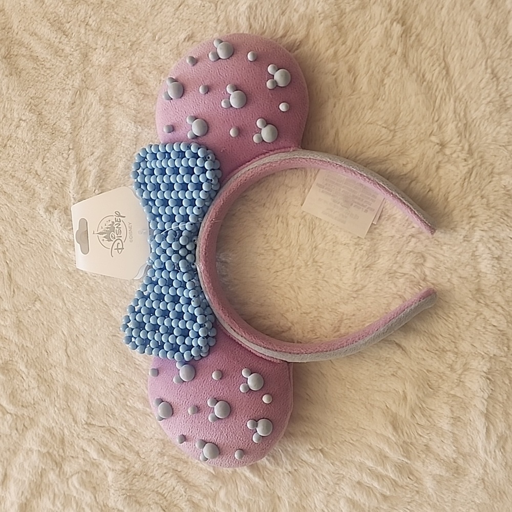 Lavender and blue Minnie Mouse ear with beadeddetails
